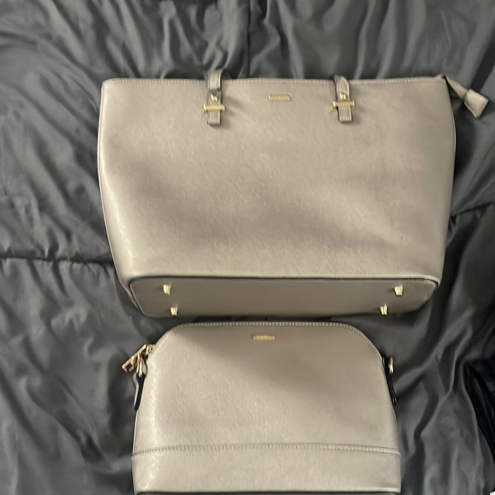 Gray purse with matching makeup bag